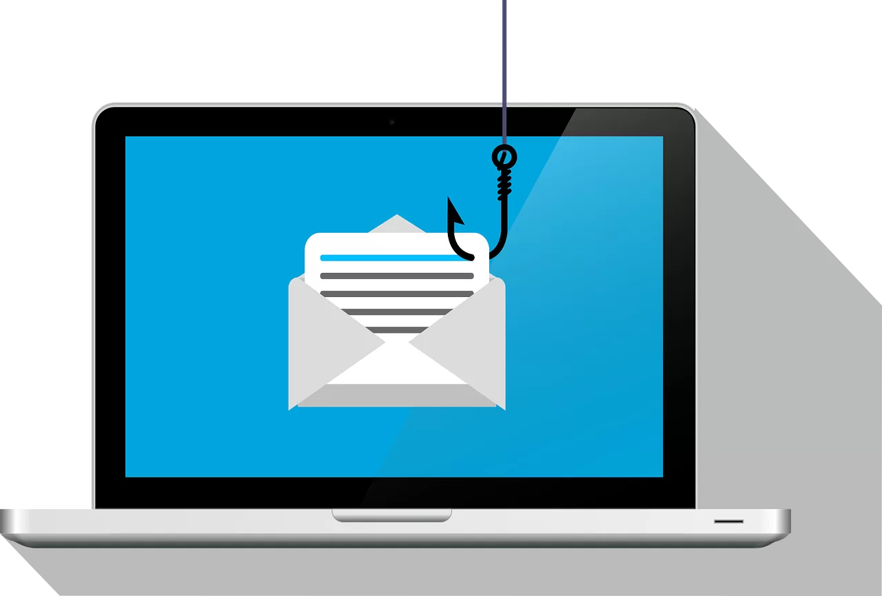 Laptop screen displaying an email icon hooked by a fishing hook, symbolizing phishing.